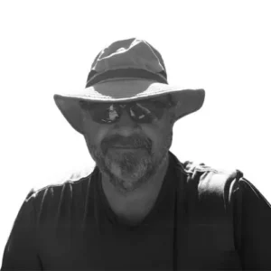 Bill Leedham with hat and black clothes.