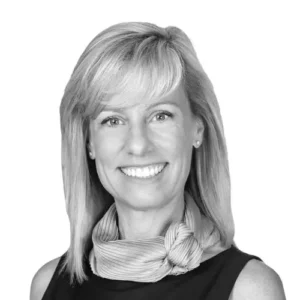 Holly Neber in black dress headshot