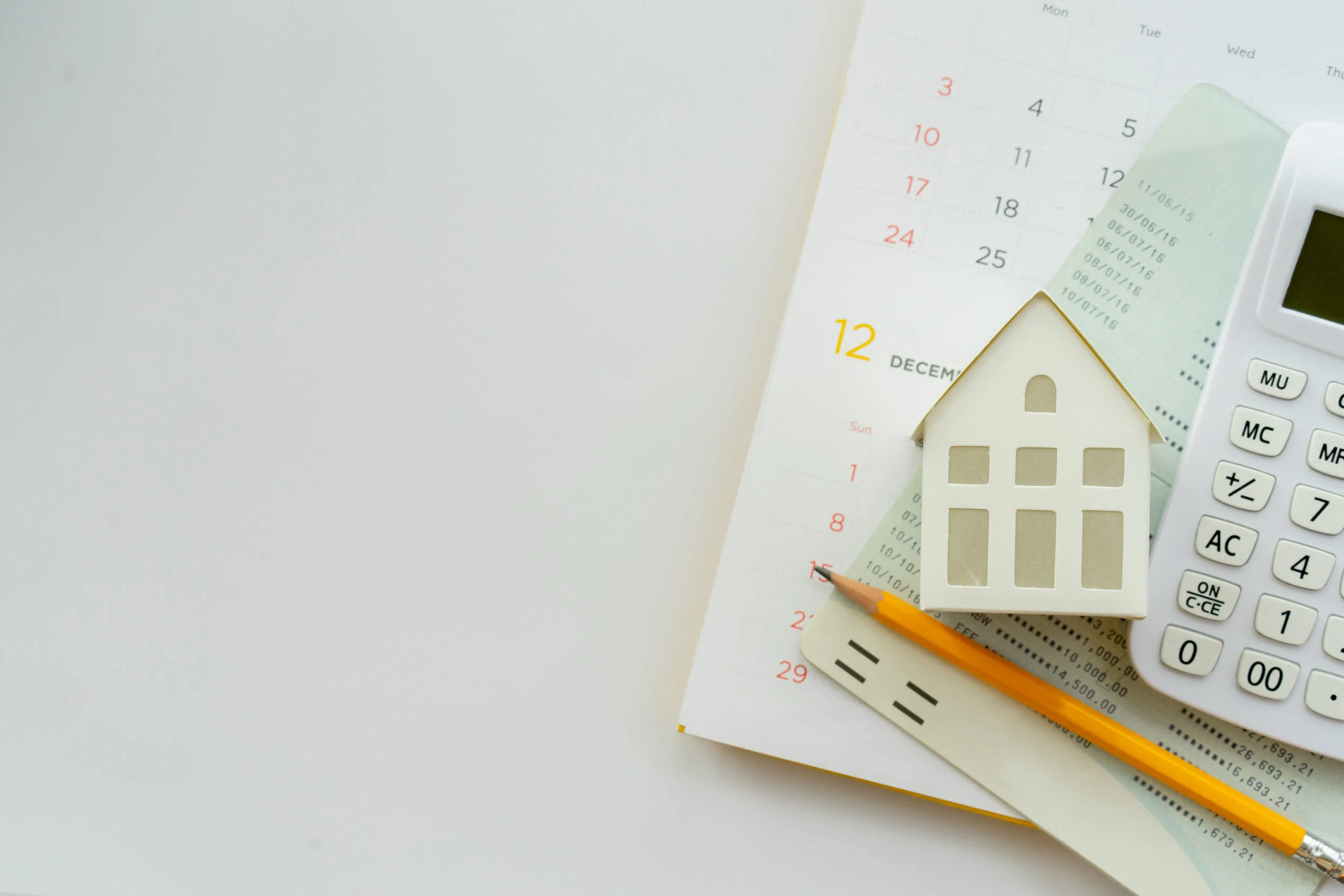 close up top view group of calculator , home model ,yellow pencil