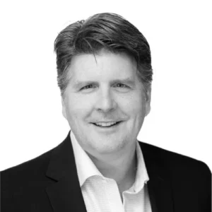 Scott Davis wear and black blazer and white shirt