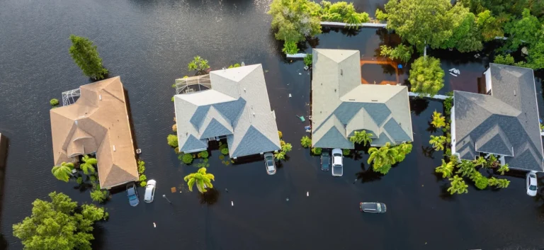 Flooded homes and cars.