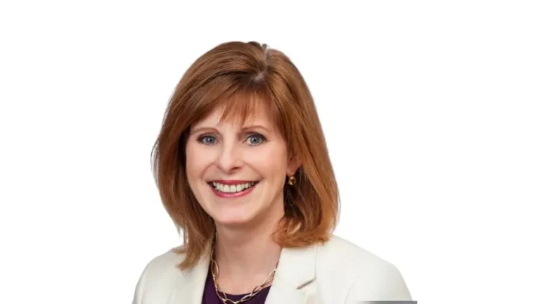 Carol headshot in white background.