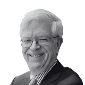 Eric W.E. Denman in suit.